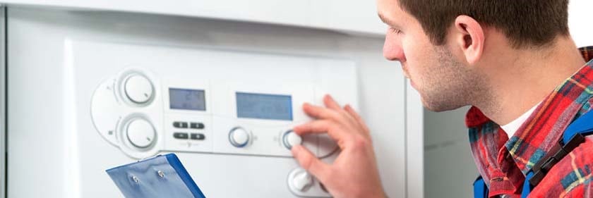 30402620 - technician servicing the gas boiler for hot water and heating